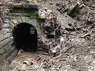 Damaged culvert in need of repair.